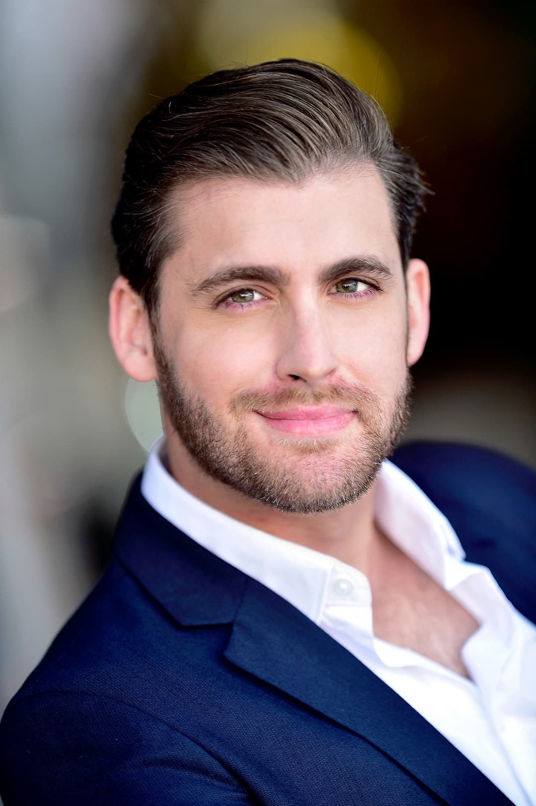 Photo of handsome caucasion male 20-something commercial realtor headshots