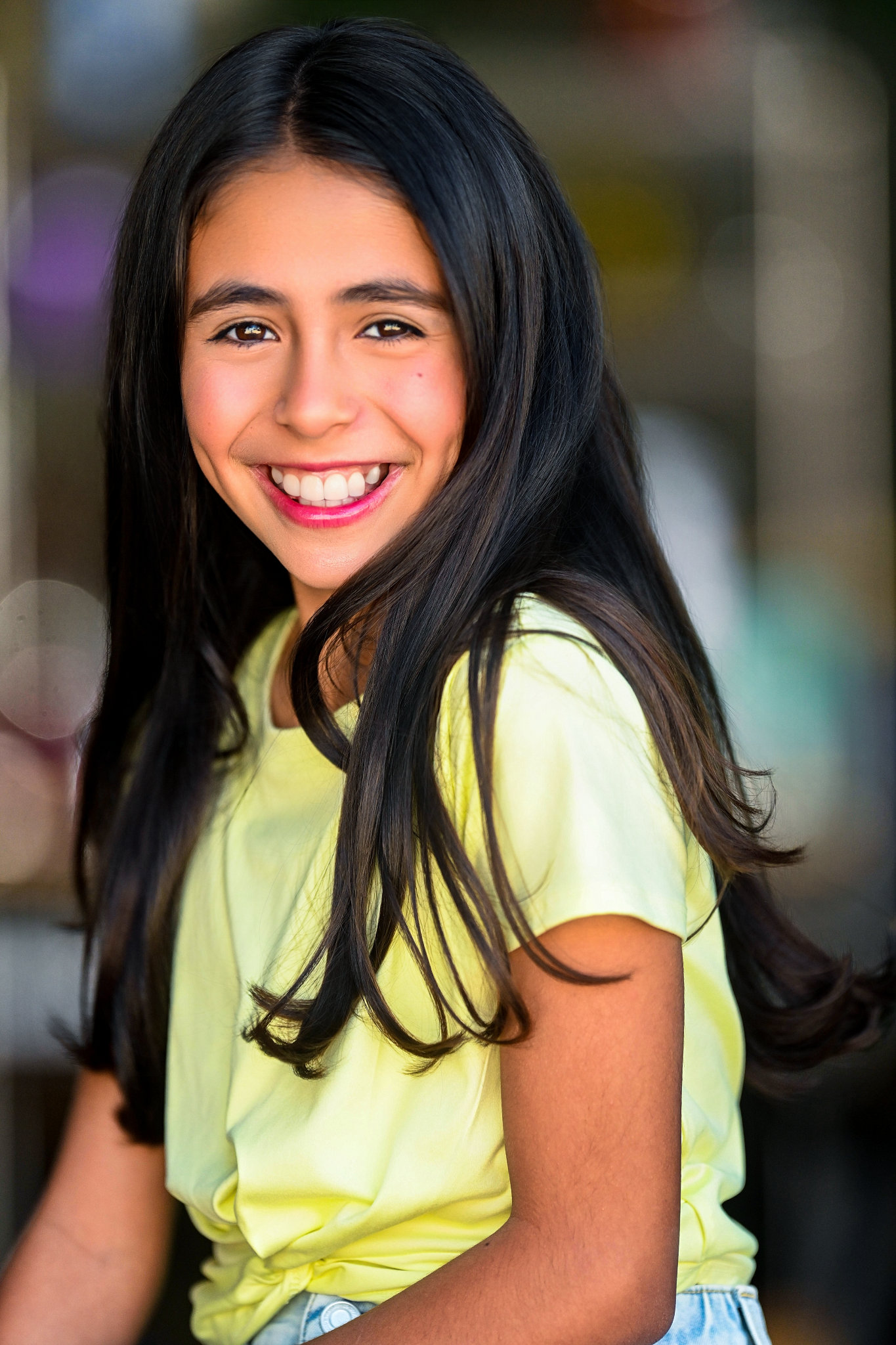 Headshots for kids of young brunette girl.